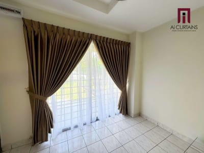 A tiled room with the same brown drapes and white sheer at a window, with a garden visible outside.
