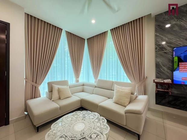 The same living room from the other side, showing the second window dressed to match the first.